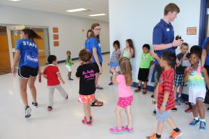 Summer Campers Walking in a Line at The HUB Recreation Center