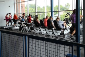 Treadmills and Bikes Full in Front Window of the Fitness Center at The HUB Recreation Center