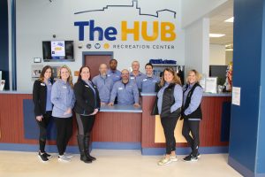 Full-Time Staff in Front of the Counter at The HUB Recreation Center