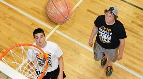 Two young men playing basketball at The HUB in Marion, Illinois