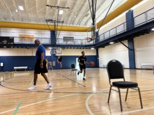 Basketball Training with Coach and Young Men